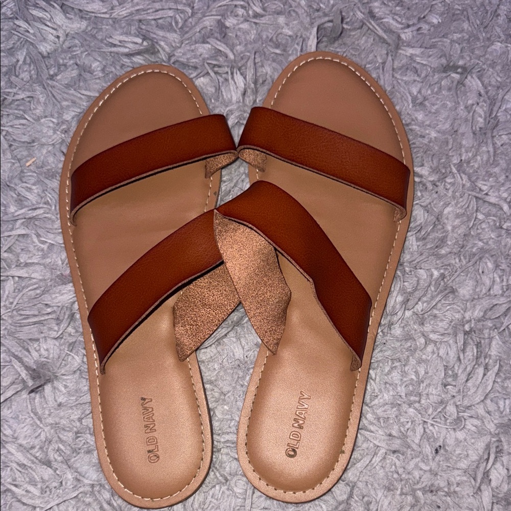 brown Old Navy slip on sandals